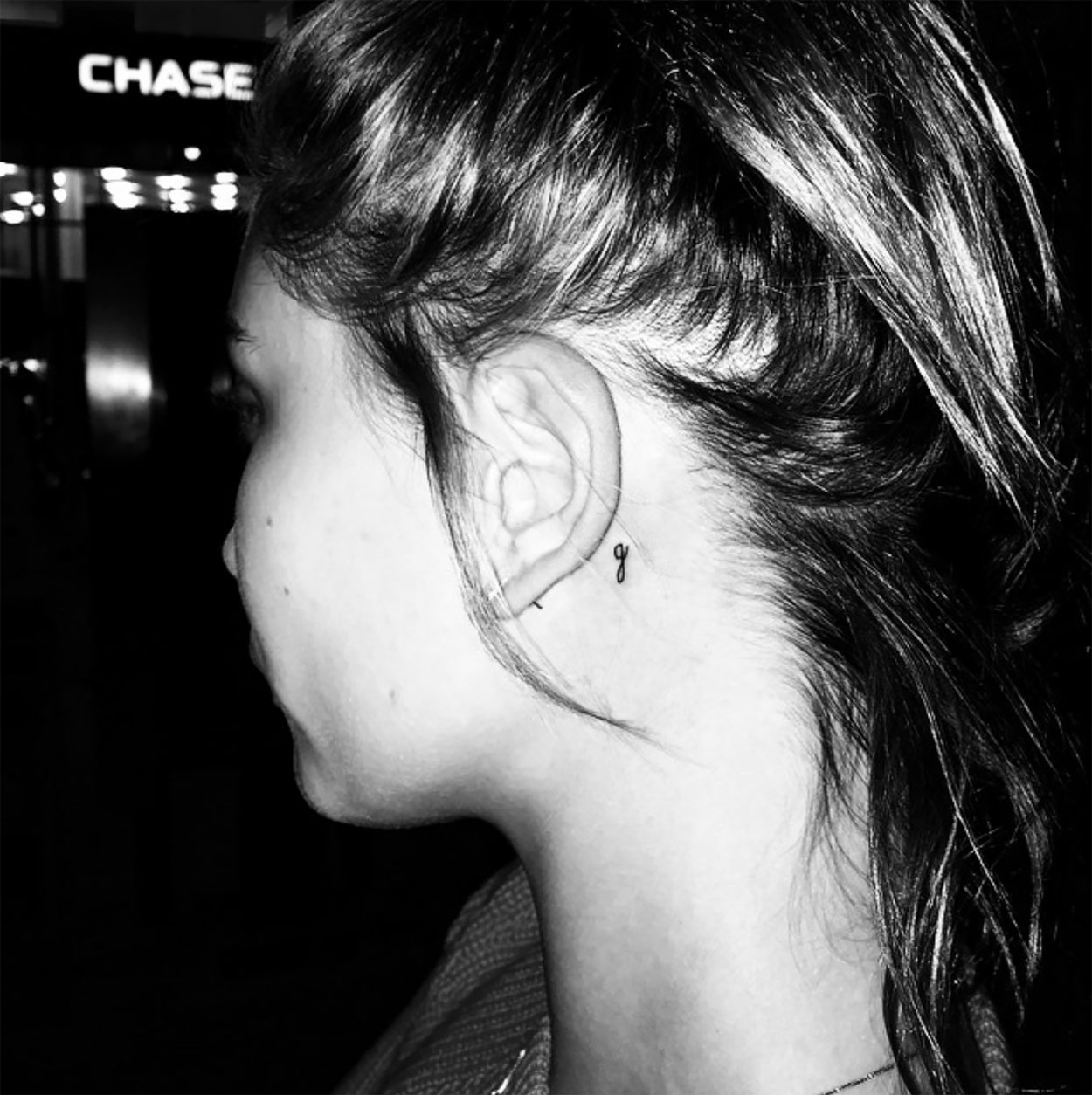 Hailey Biebers Tattoo Artist Gives A Close Look At The Ink Behind Her Ear