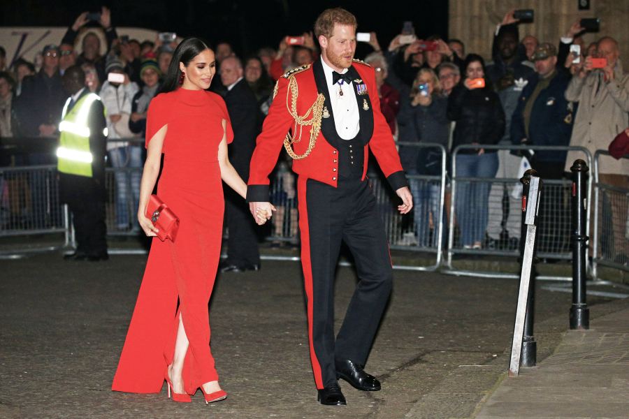 Prince Harry and Duchess Meghan Hold Hands in Matching Red at Festival of Music