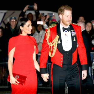 Prince Harry and Duchess Meghan Hold Hands in Matching Red at Festival of Music