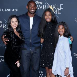 Kobe Bryant’s Daughter Natalia Poses In Front of Mural of Dad and Sister Gianna as She Attends Winter Formal