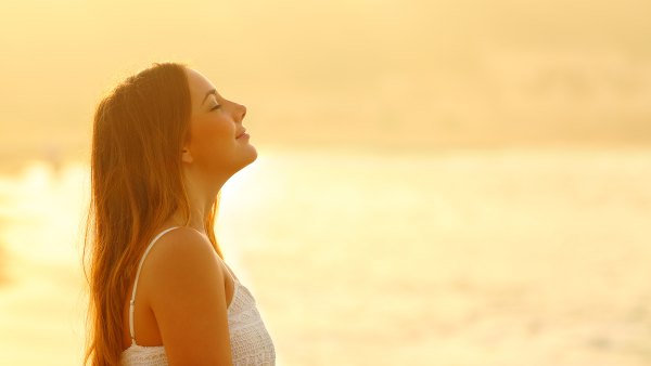woman-breathing-fresh-air