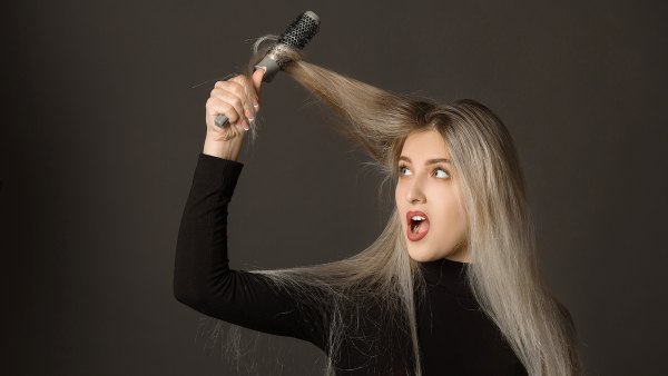 woman-brushing-hair