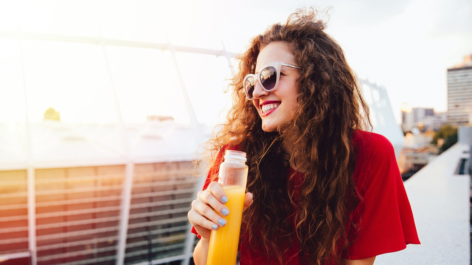 woman-drinking-orange-juice