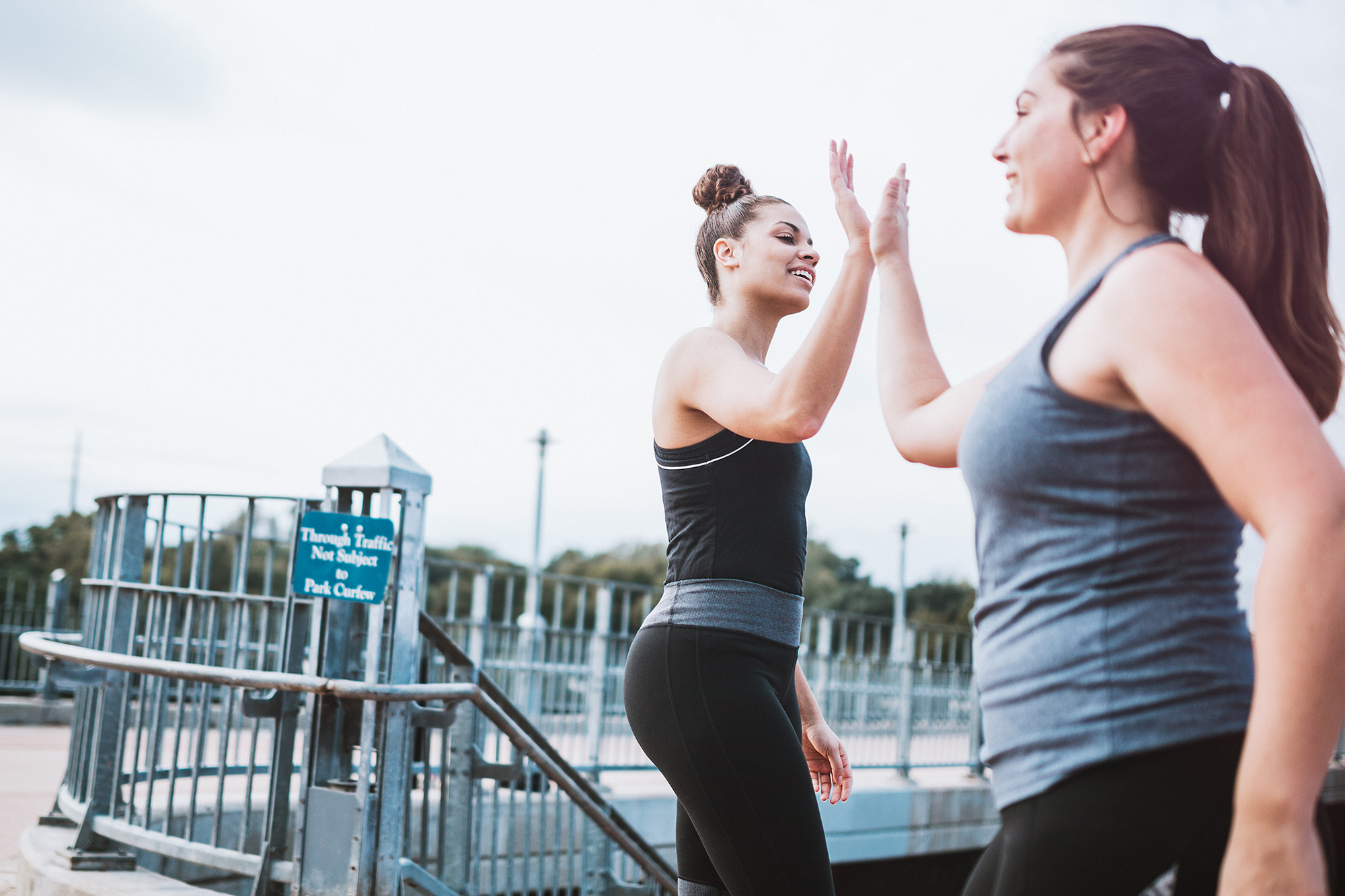 Women High Five After Run
