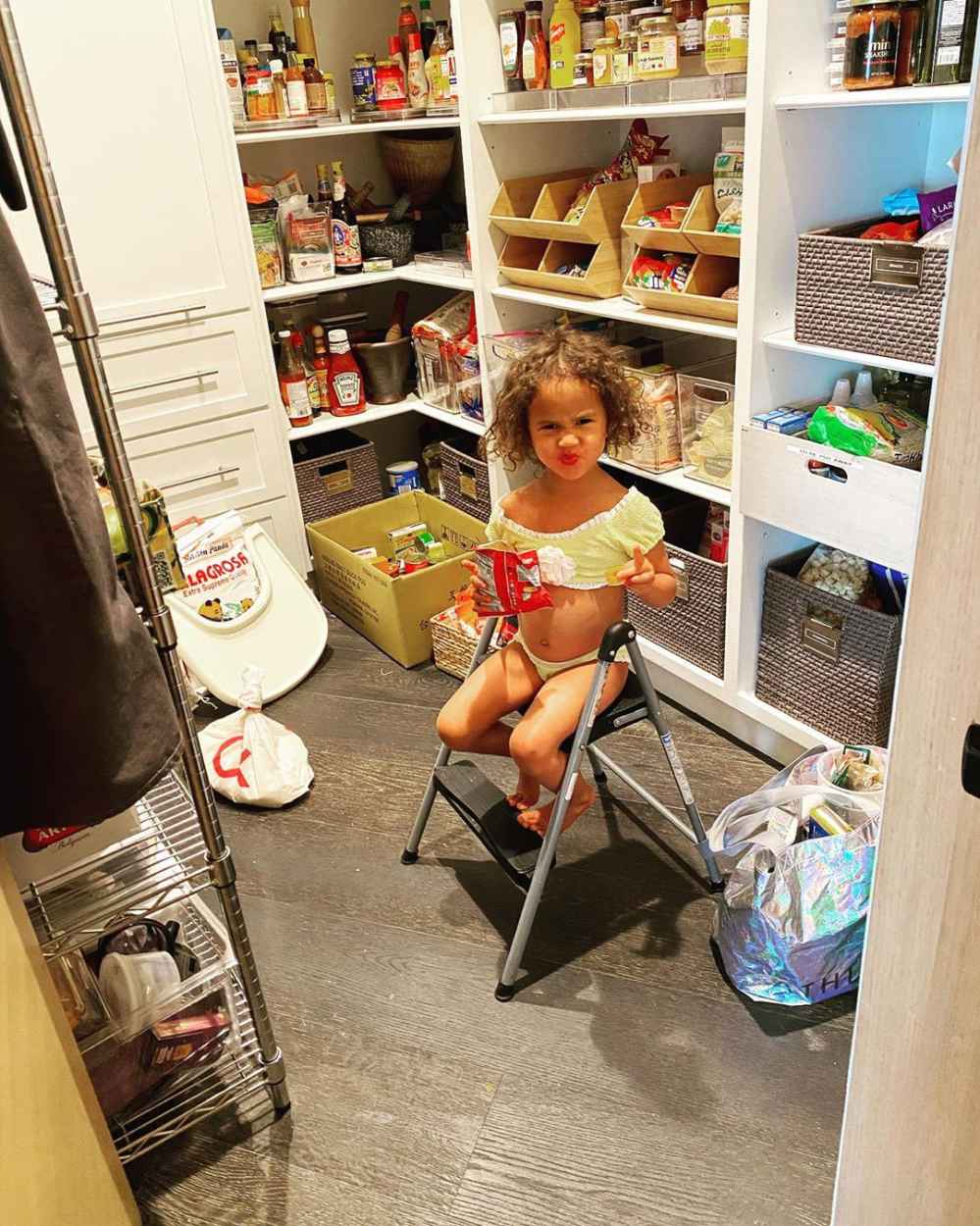 Chrissy Teigen Catches Daughter Luna Snacking in the Pantry