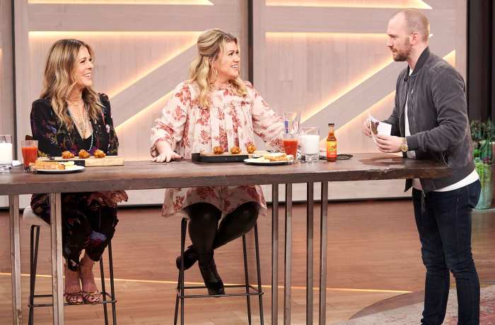Kelly Clarkson Reveals Which John Legend Song She Never Wants to Hear Again Instead of Eating a Hot Wing Rita Wilson, Kelly Clarkson, Sean Evans Kelly Clarkson Show