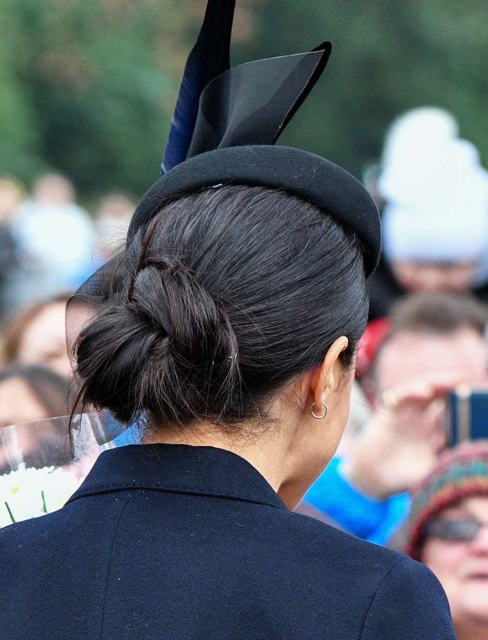 Meghan Markle's Messy Bun Was an Intentional Blend of Royal and Trendy