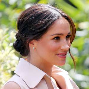 Meghan Markle's Messy Bun Was an Intentional Blend of Royal and Trendy