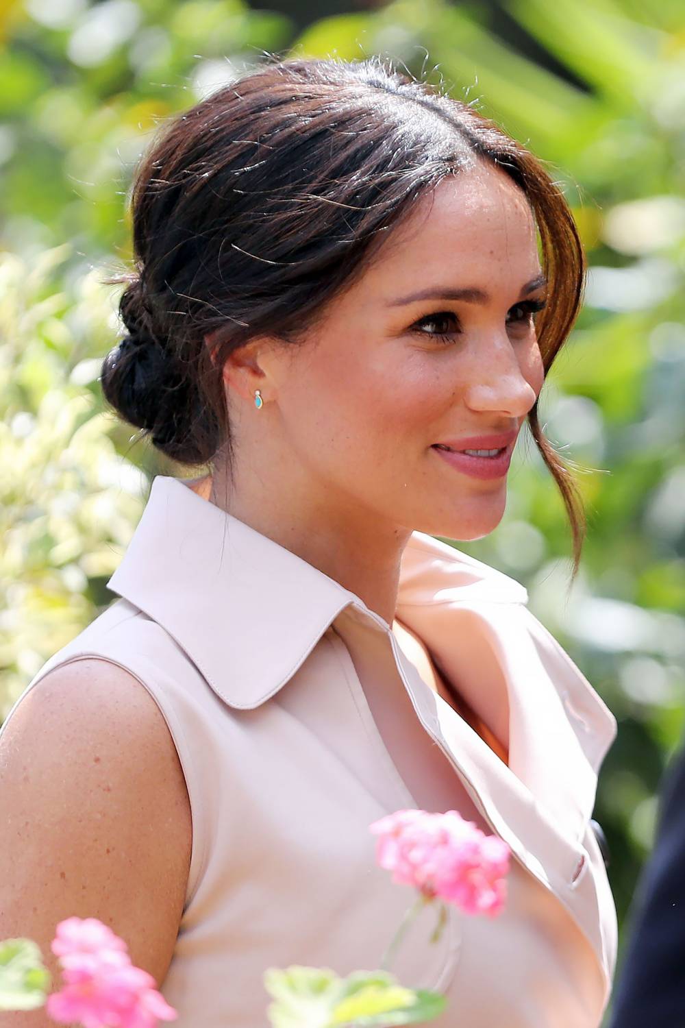Meghan Markle's Messy Bun Was an Intentional Blend of Royal and Trendy