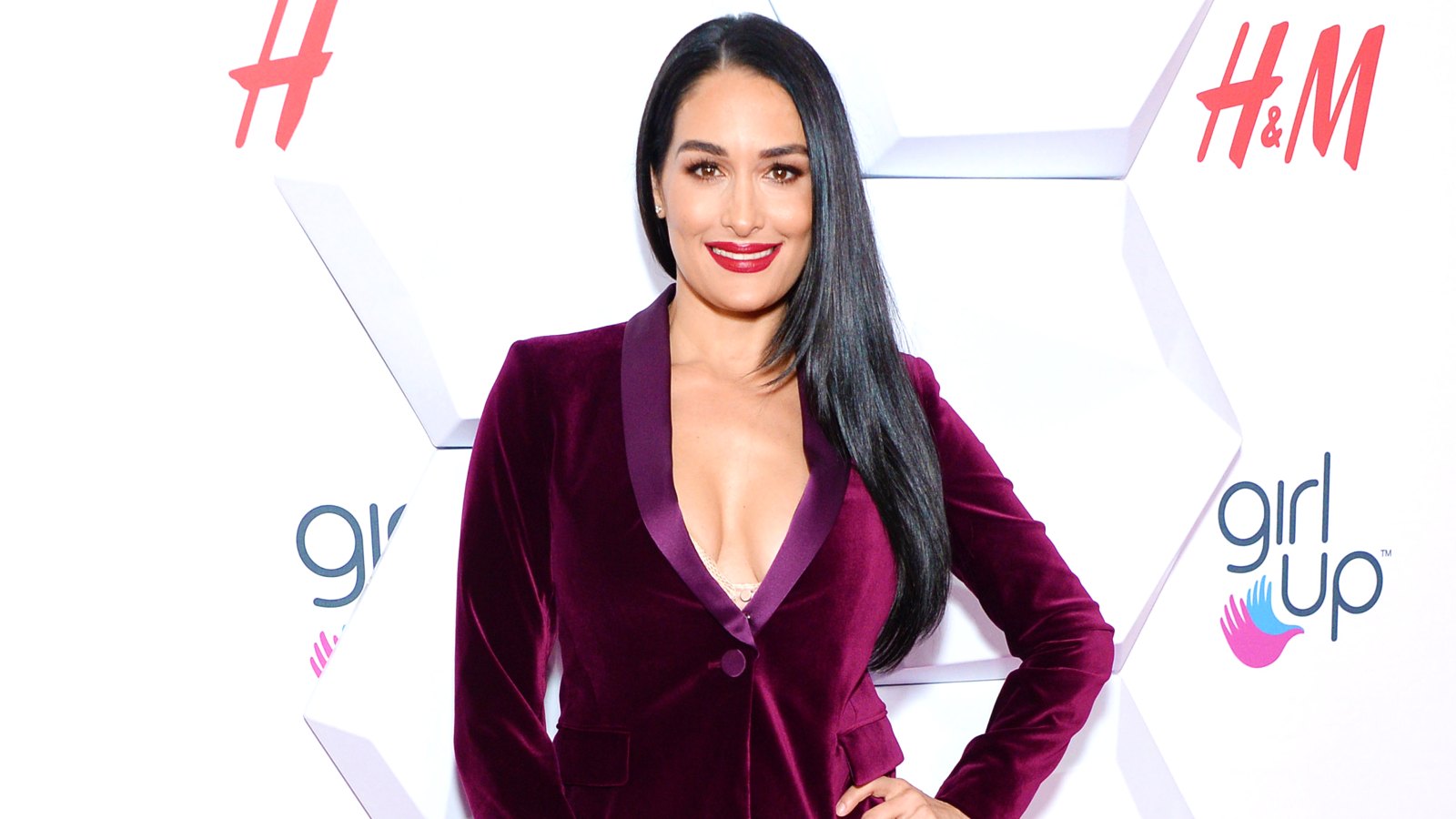 Nikki Bella Shows Off Her Bare Baby Bump While Dancing in WWE Costume