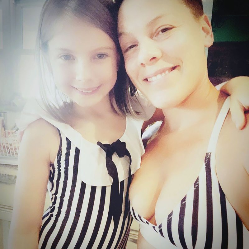 Pink and 8-Year-Old Daughter Willow Twin in Matching Swimsuits