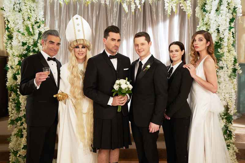 Eugene Levy as Johnny Catherine O'Hara as Moira Dan Levy as David Noah Reid as Patrick Emily Hampshire as Stevie and Annie Murphy as Alexis in the series finale of Schitts Creek