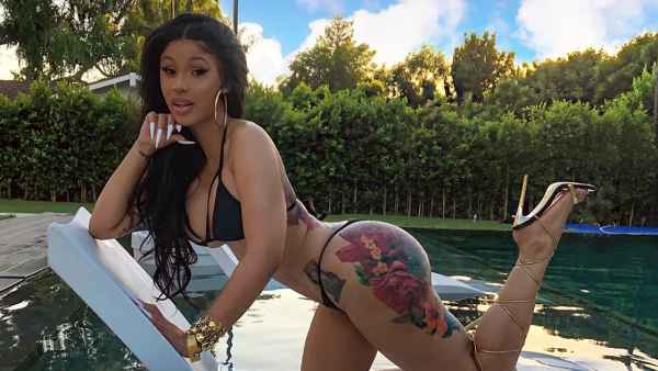 Cardi B Admits She 'Sucks It In' When Modeling a Tiny String Bikini