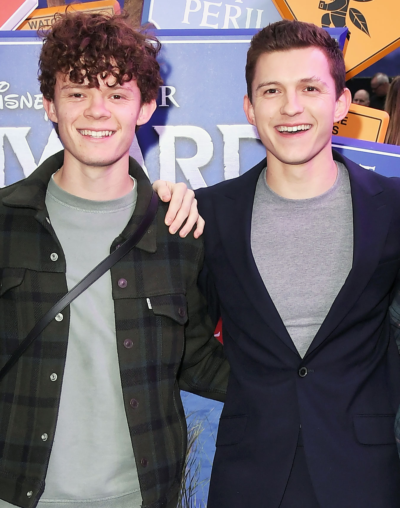 Tom Holland Gives Brother Harry a Salon-Quality Haircut at Home
