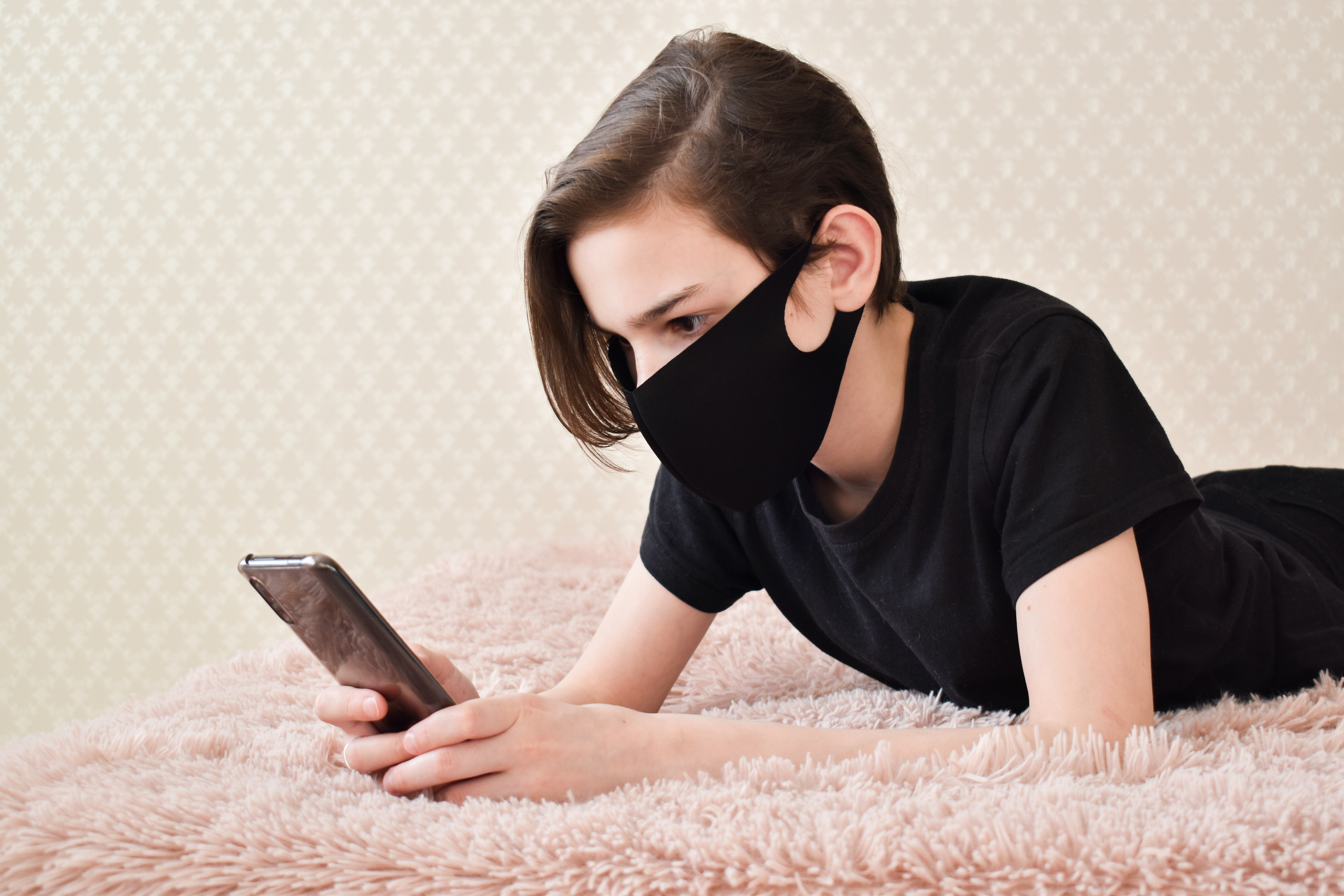 black face mask stock photo
