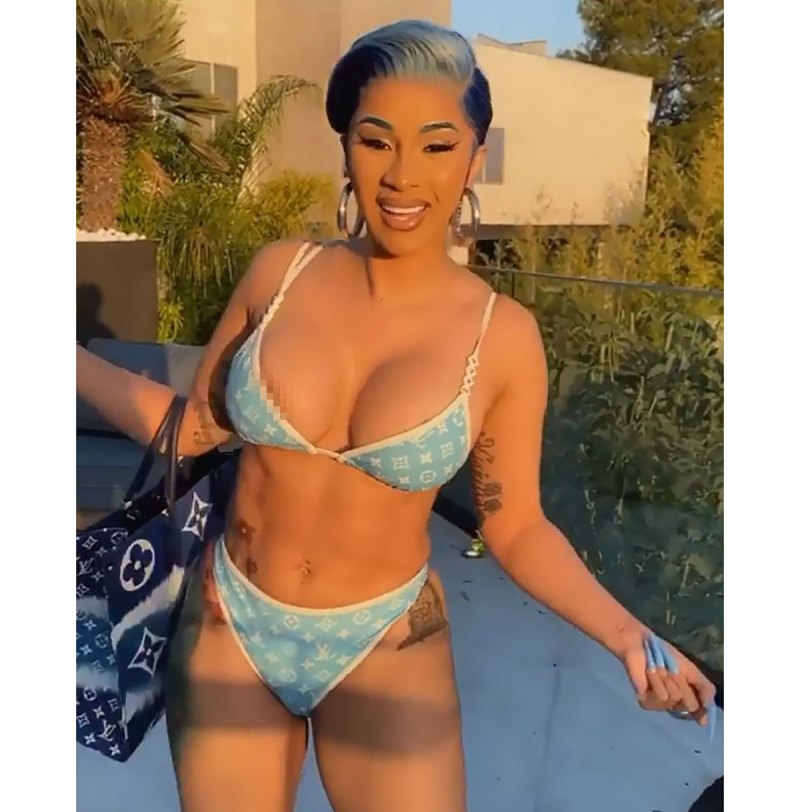 The rapper asked haters to "leave her rolls alone," as she showed...