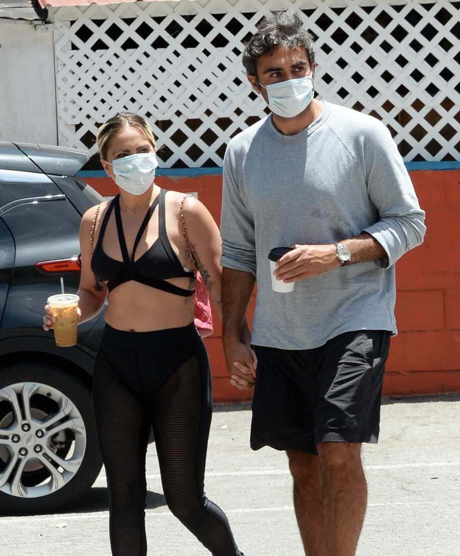 Lady Gaga and Michael Polansky Mask Holding Hands Hug