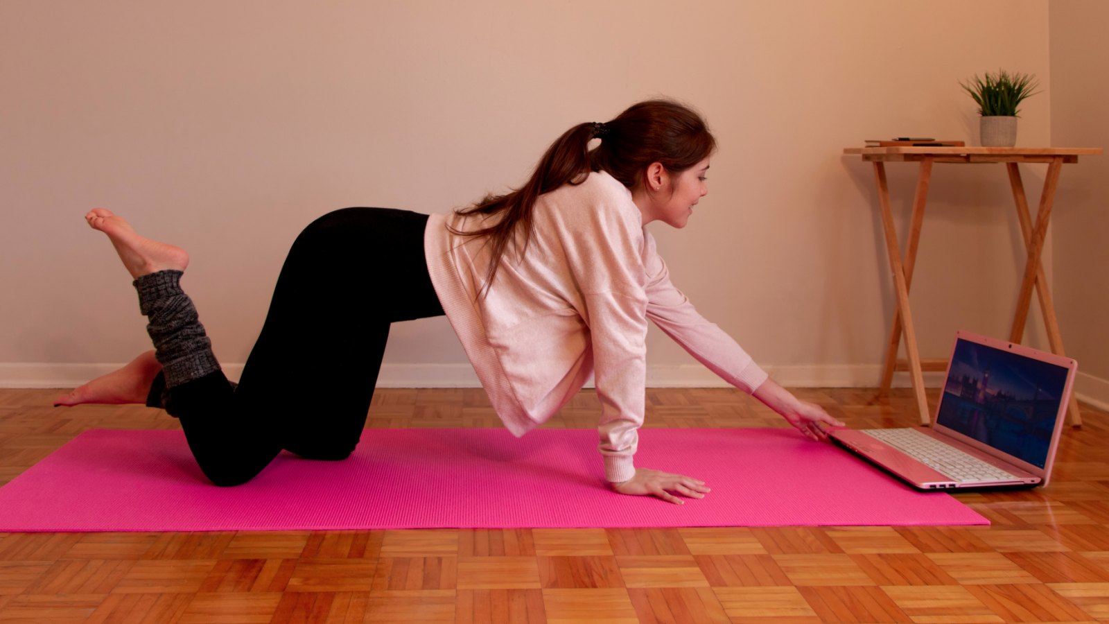 woman-doing-yoga-at-home