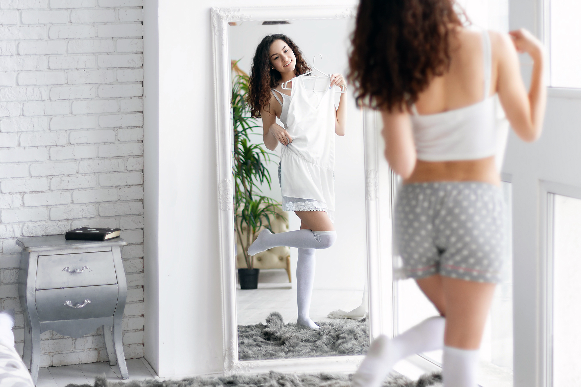 woman-trying-on-clothes