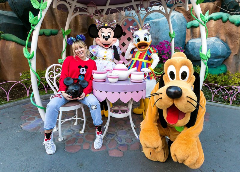 Miley Cyrus Celebs Visit Disney Theme Parks