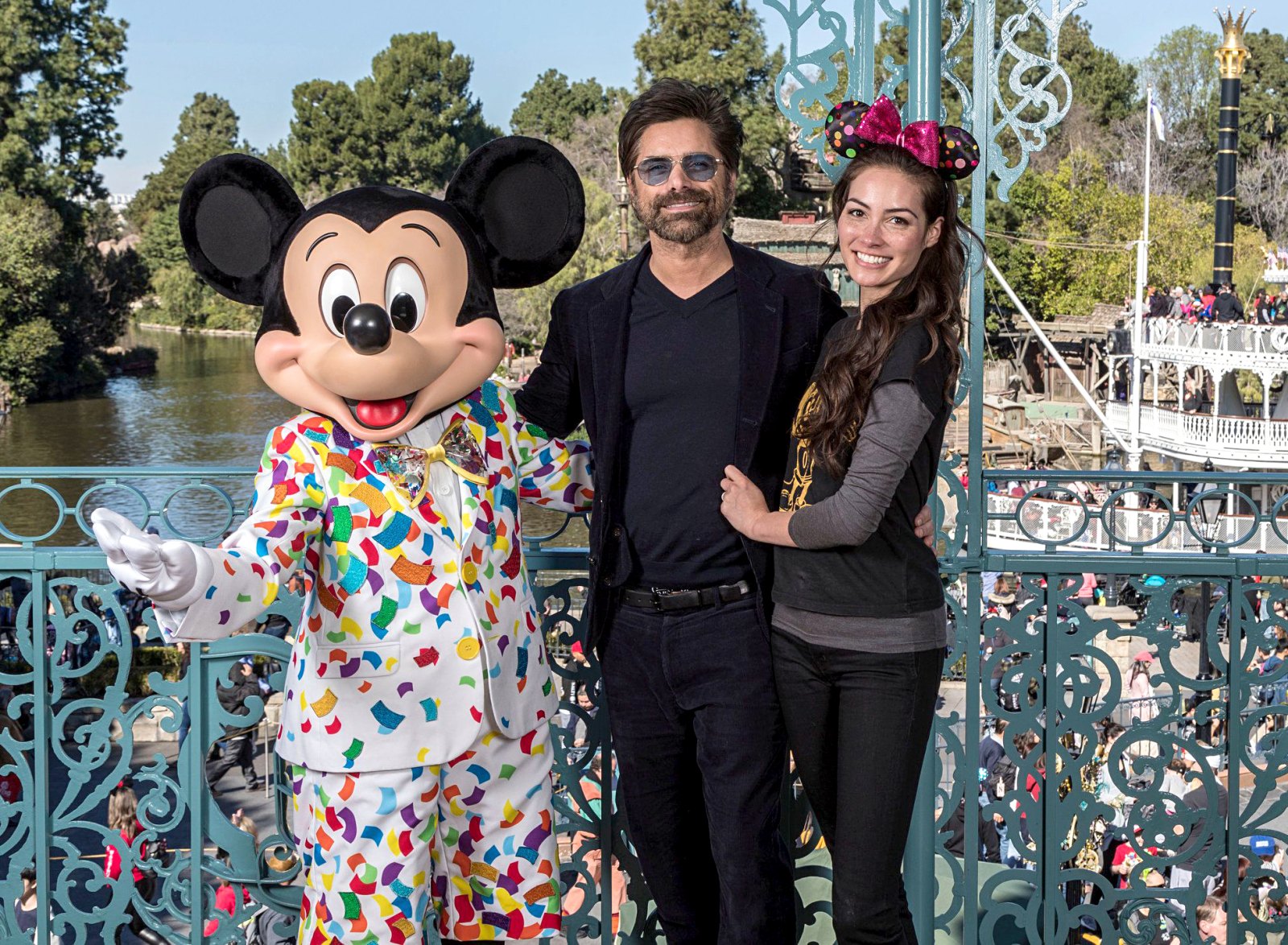 John Stamos and Caitlin McHugh Celebs Visit Disney Theme Parks