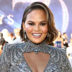 Chrissy Teigen Admits She Might Have Another Breast Reduction Surgery: 'They're Still Huge'