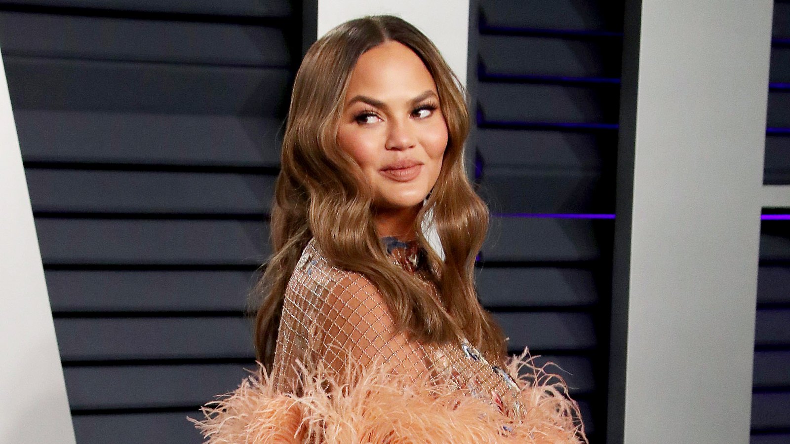 Chrissy Teigen Slams Claims She Dropped 50 Pounds Has Cancer