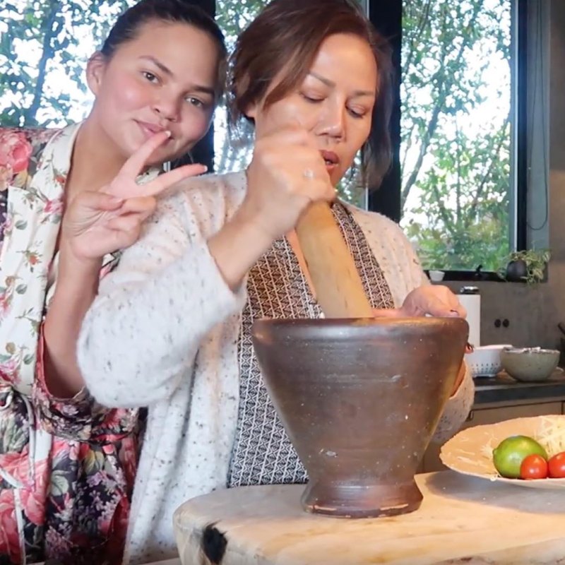 Chrissy Teigen cooking with mom