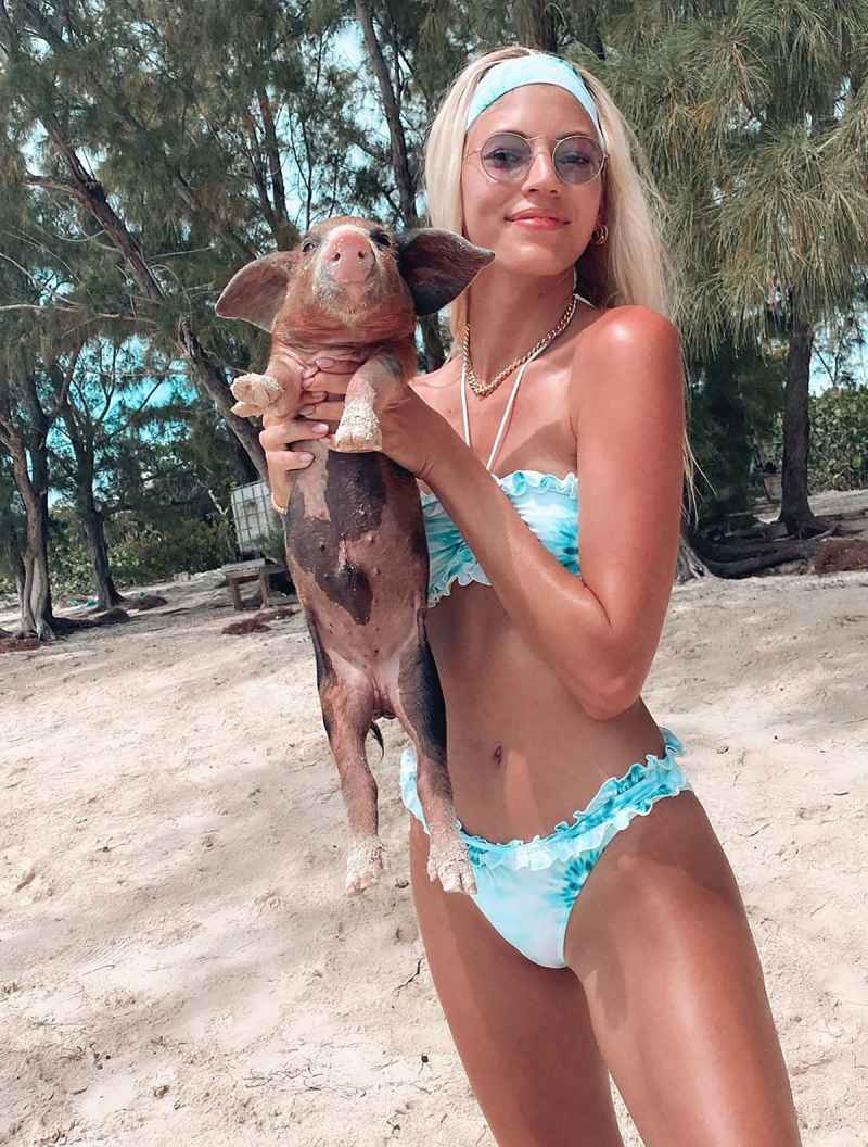 Devon Windsor Holds a Pig Named Wilber in a Tie-Dye Bikini