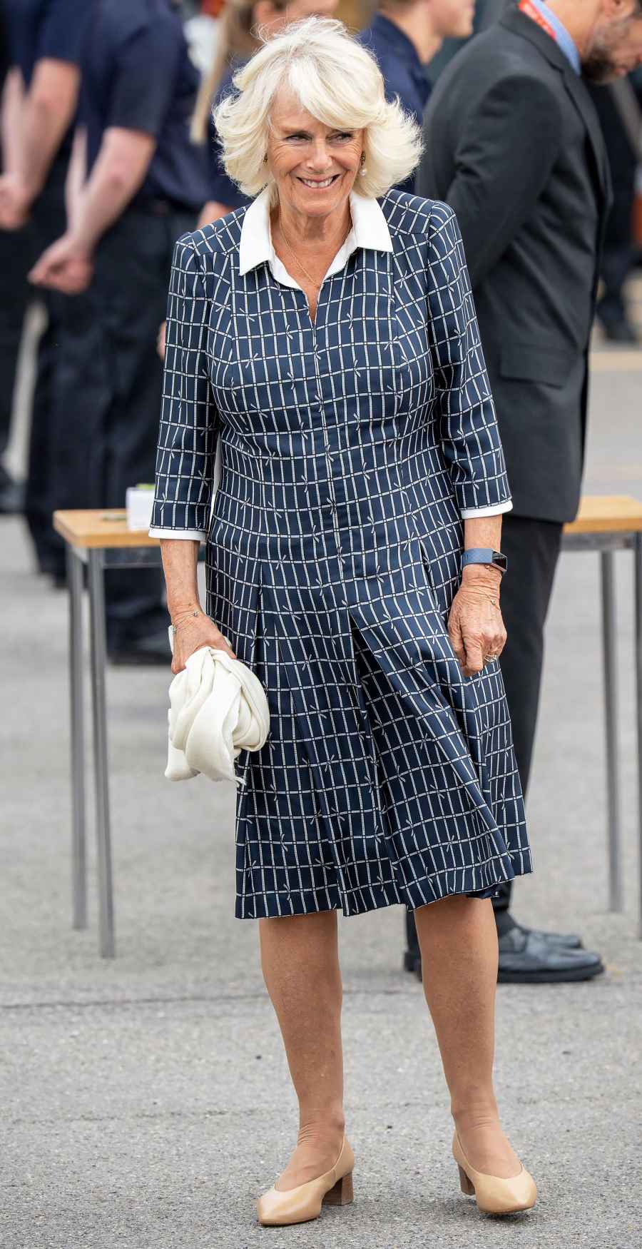 Duchess Camilla Dazzles in a Patterned Pleated Frock