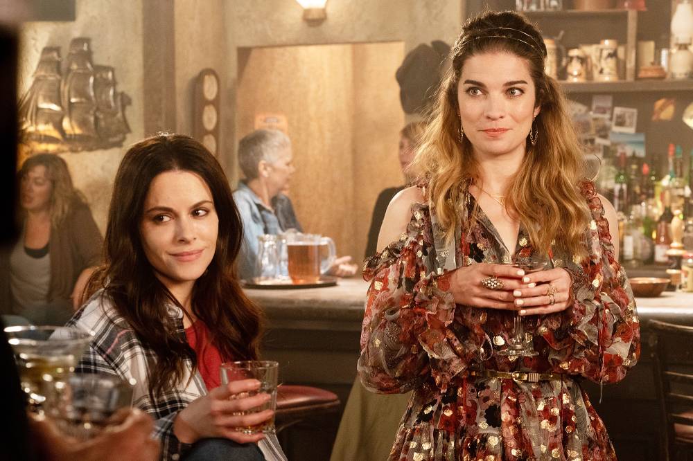 Emily Hampshire and Annie Murphy in Schitts Creek Schitts Creek Star Annie Murphy Choked on Bacon After Finding Out About Her Emmy Nomination