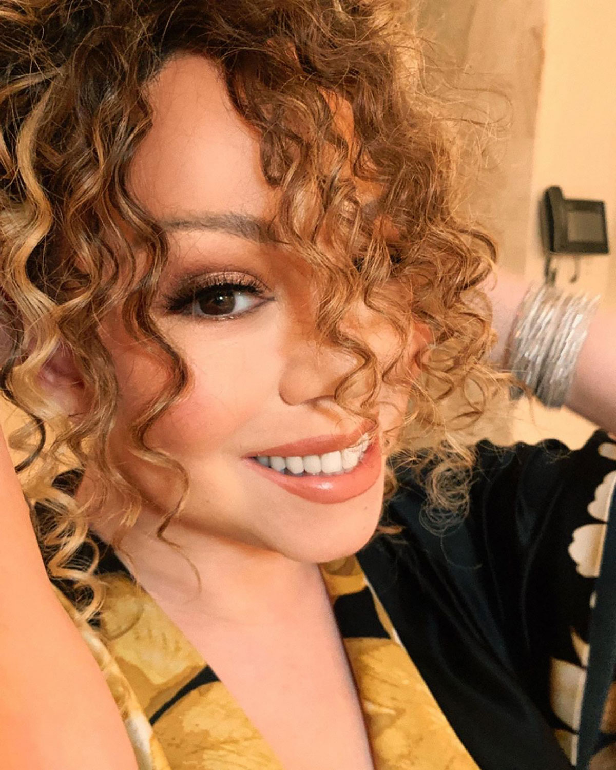 Celebs With Curly Hair: Perms, Spirals, Natural Coils Hair Trend