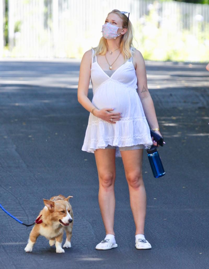 Pregnant Sophie Turner Cradles Her Baby Bump on a Walk With Joe Jonas