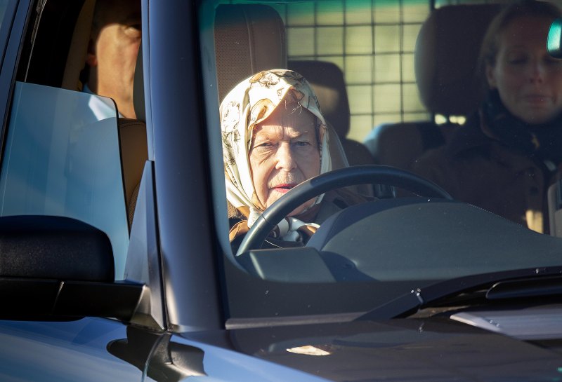 Queen Elizabeth II driving a car