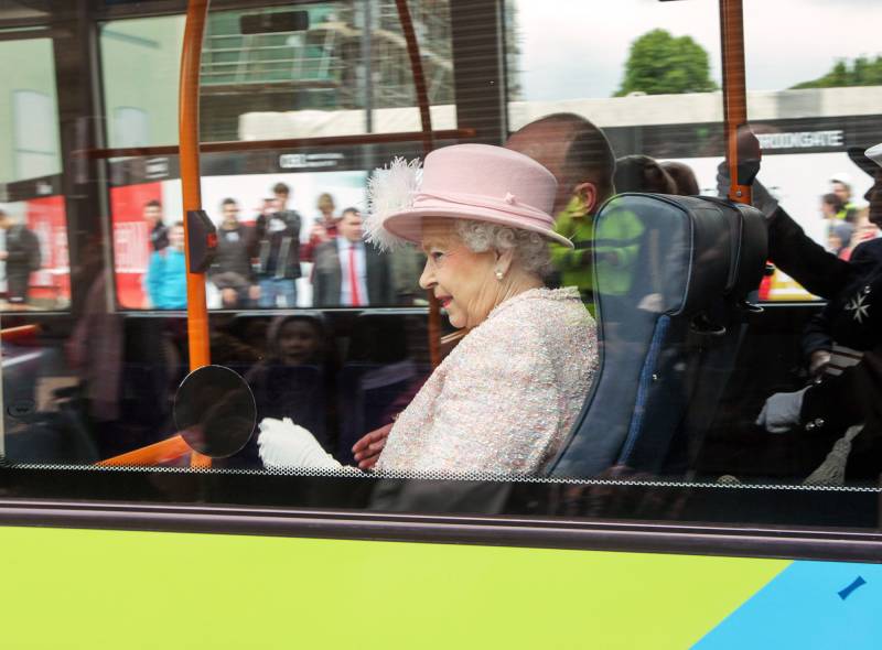 Queen Elizabeth II rides the bus
