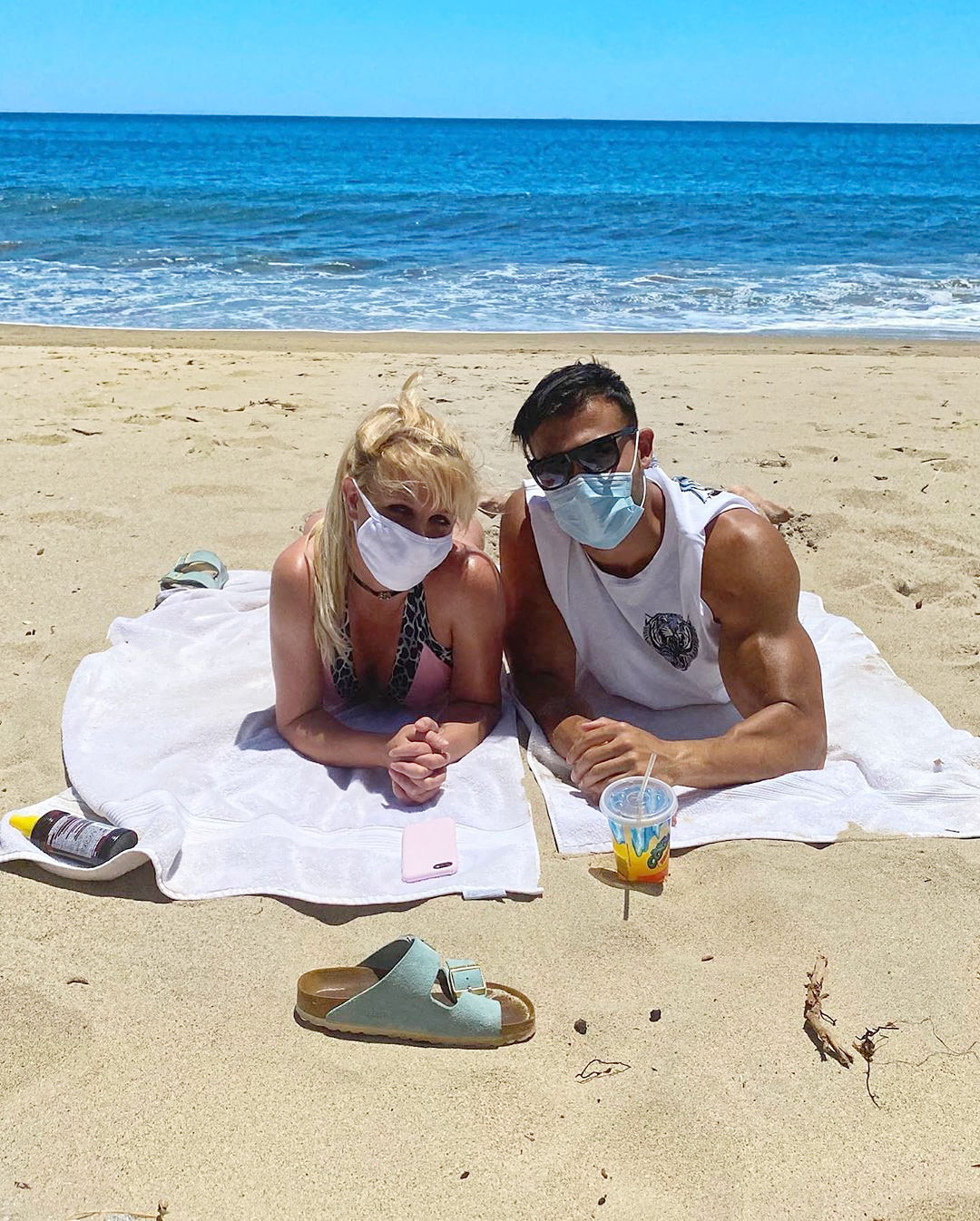 Britney Spears and Sam Asghari Relationship Timeline Wearing Face Masks at the Beach