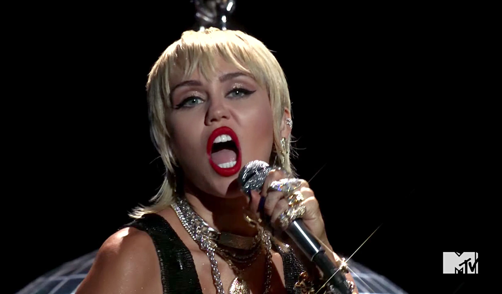 Watch Miley Cyrus Channel ‘Wrecking Ball’ With ‘Midnight