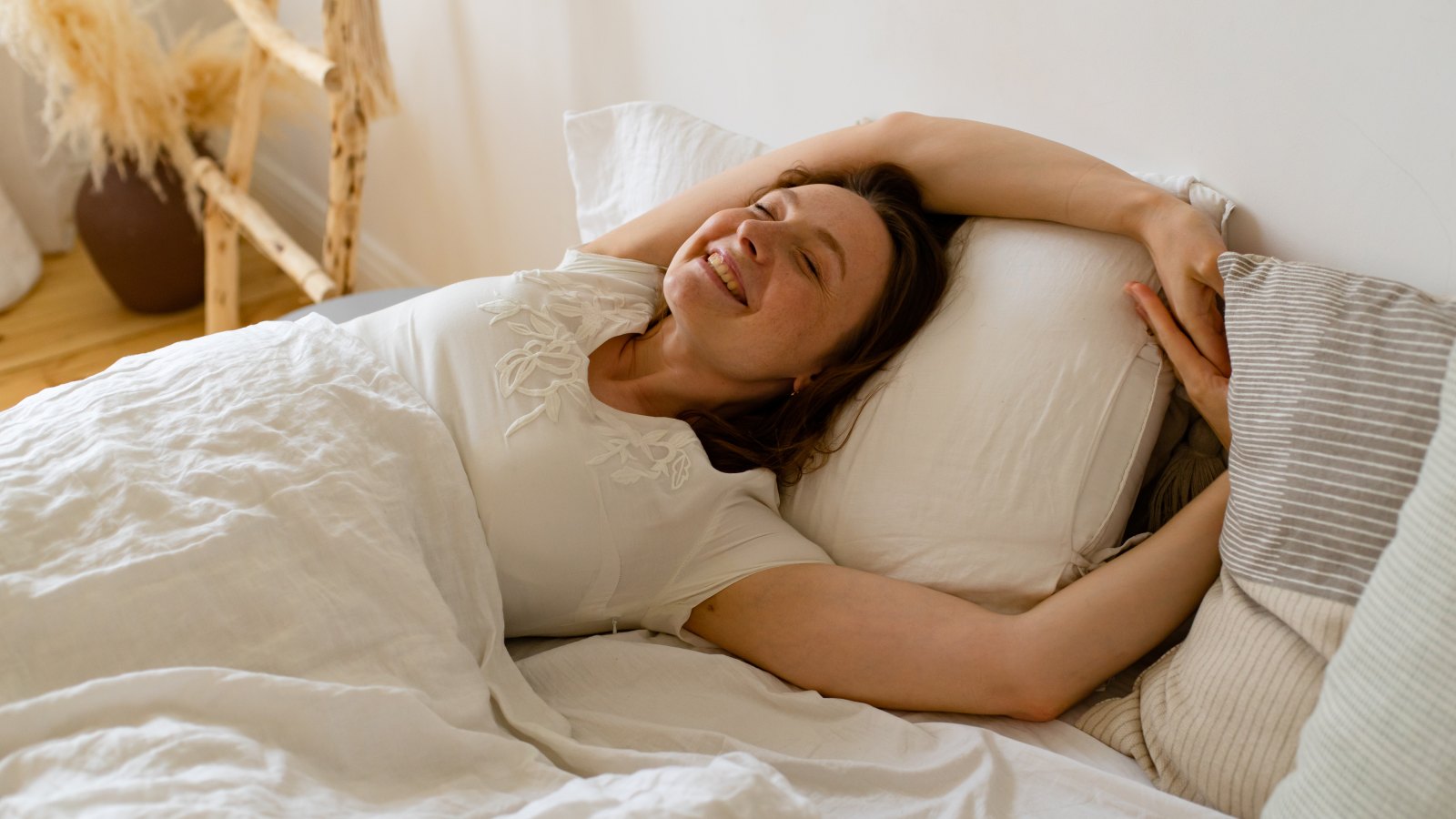 woman in bed waking up
