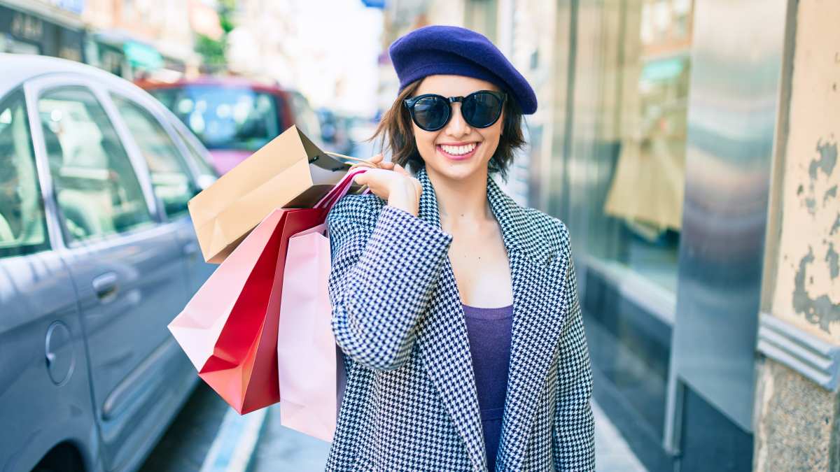 woman with shopping bags stock photo