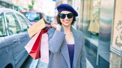 woman with shopping bags stock photo