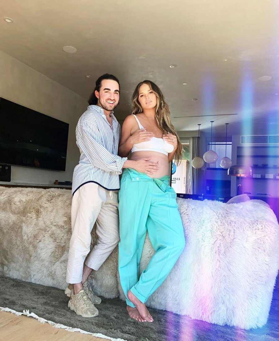 Pregnant Chrissy-Teigan Baby Bump Posing with Interior Designer Jake Arnold