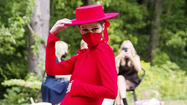 Pregnant Coco Rocha Turns Heads on the Christian Siriano NYFW Runway Showing Off Her Baby Bump in a Red Gown