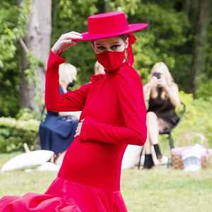 Pregnant Coco Rocha Turns Heads on the Christian Siriano NYFW Runway Showing Off Her Baby Bump in a Red Gown