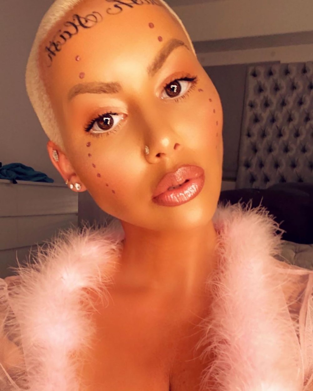 Amber Rose on Her Face Tattoos, Ignoring Haters Us Weekly