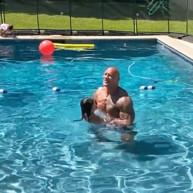 Dwayne Johnson and Daughter Jasmine Playing in a Swimming Pool