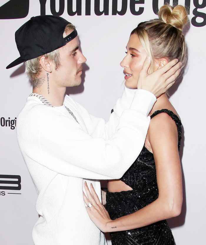 Justin Bieber Holding Hailey Bieber Face at the premiere of Justin Bieber Seasons Hilaria Baldwin Says Justin Bieber and Hailey Baldwin Are Definitely Soulmates