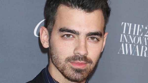 Joe Jonas Showcases Never-Before-Seen Arm Tattoos