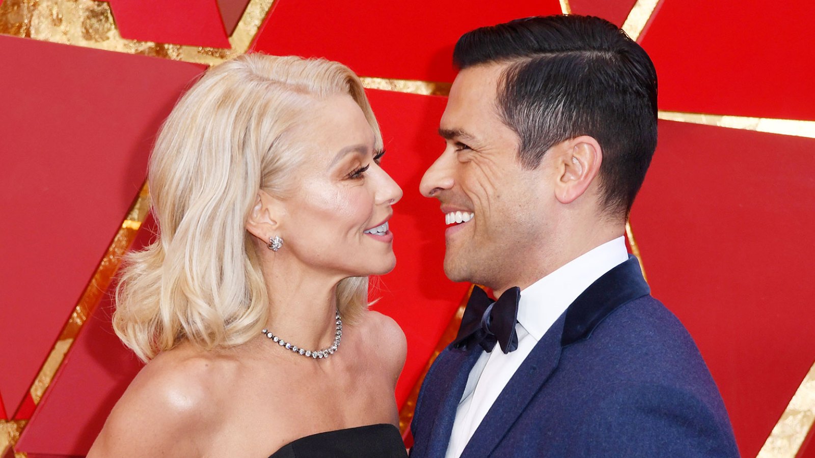 Kelly Ripa and Mark Consuelos attend the 90th Annual Academy Awards Kelly Ripa and Mark Consuelos Still Have an Infectious Energy Together As She Turns 50