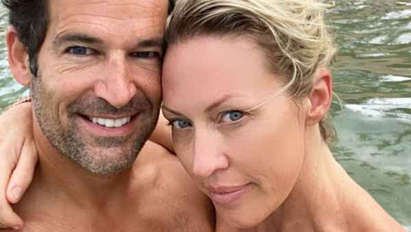 Sean Burke and Braunwyn Windham-Burke on the beach in Puerto Rico Real Housewives Of Orange County Braunwyn Windham-Burke Says She and Husband Sean Burke Have a Modern Marriage After Split Speculation