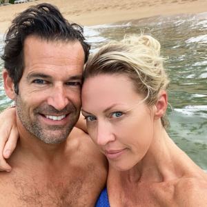 Sean Burke and Braunwyn Windham-Burke on the beach in Puerto Rico Real Housewives Of Orange County Braunwyn Windham-Burke Says She and Husband Sean Burke Have a Modern Marriage After Split Speculation